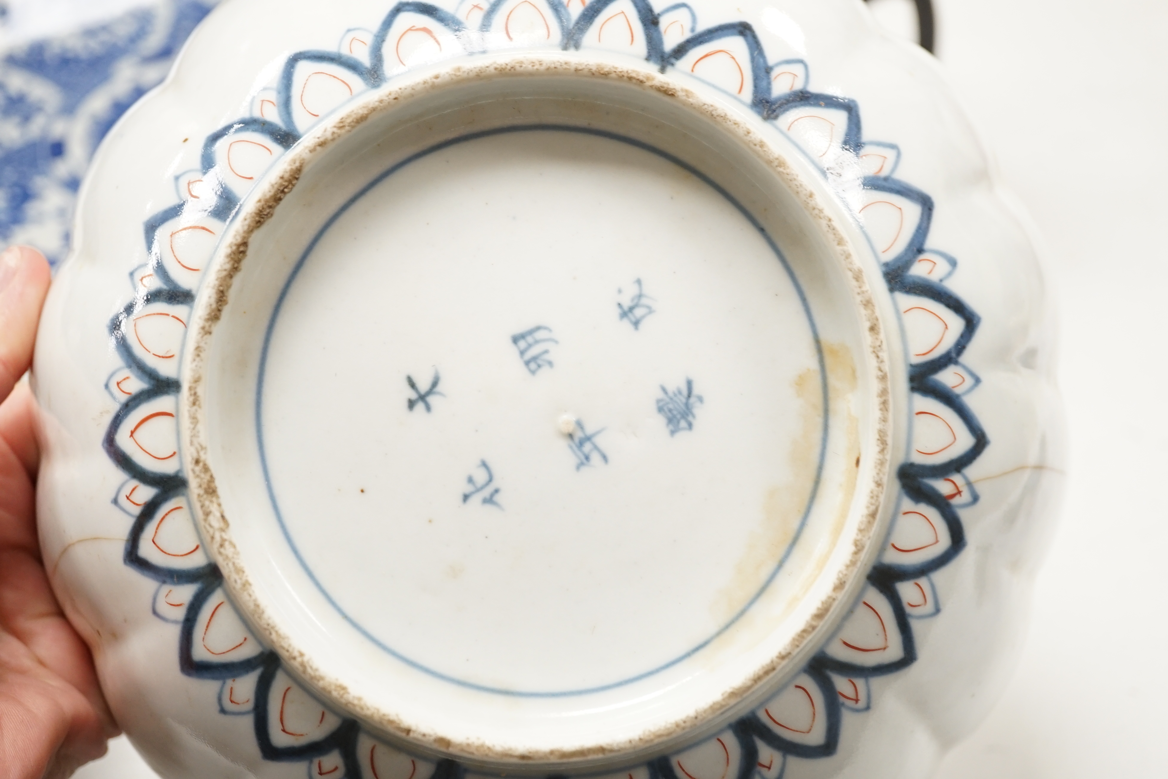 A Japanese bronze and mixed metal tripod vessel, a pair of 19th century Japanese Imari scalloped bowls, 22.5 cm diameter and a blue and white plate